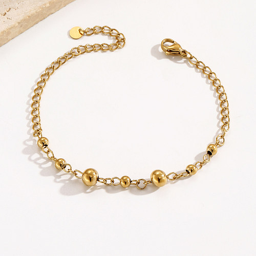 Pulseras redondas chapadas en oro de 14 quilates de acero inoxidable con círculo de estilo simple