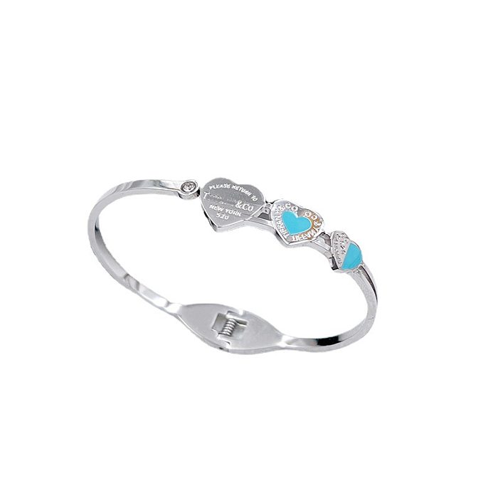 Bracelet en Zircon avec incrustation de placage en acier titane en forme de cœur de style simple