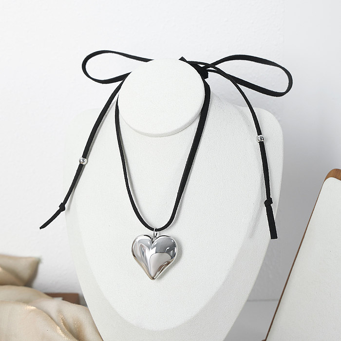 Colar com pingente de chapeamento de aço inoxidável em formato de coração estilo simples casual