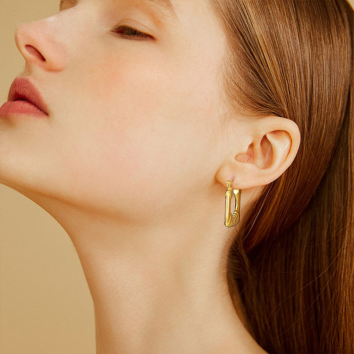 1 paire de boucles d'oreilles plaquées or 18 carats, Style Simple, couleur unie, en acier inoxydable