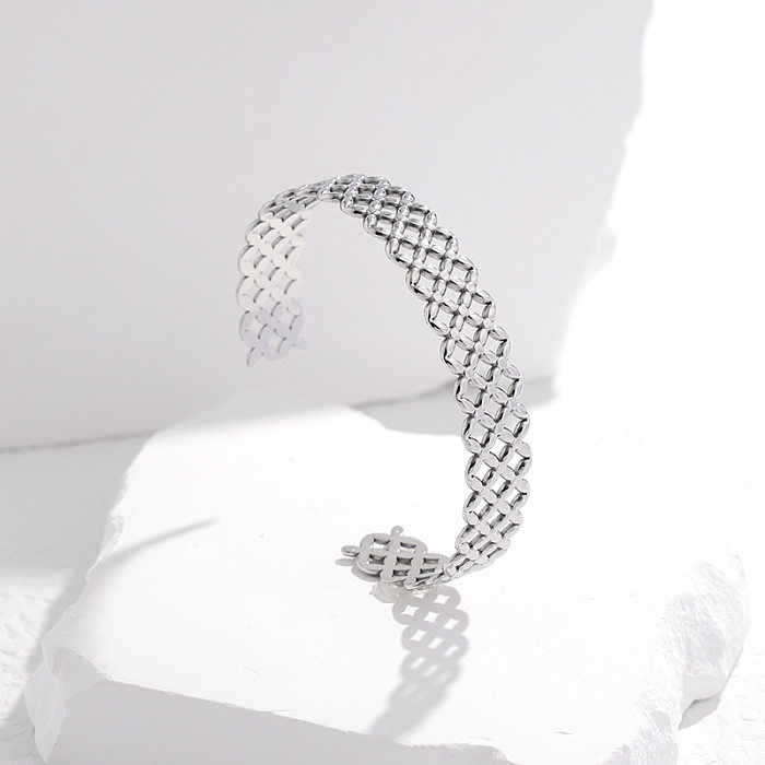 Brazalete con revestimiento de acero y titanio Fashion Grid, 1 pieza
