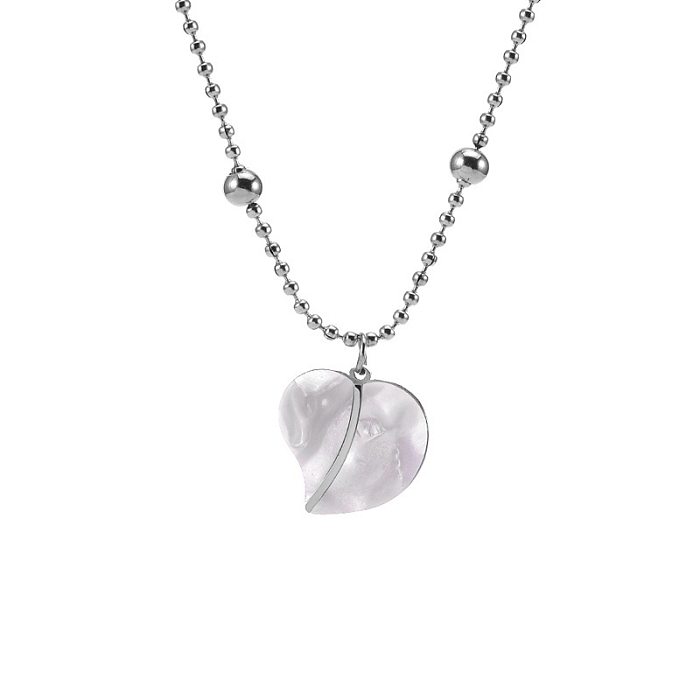 Collier pendentif en forme de coeur doux en acier inoxydable avec incrustation de coquillage