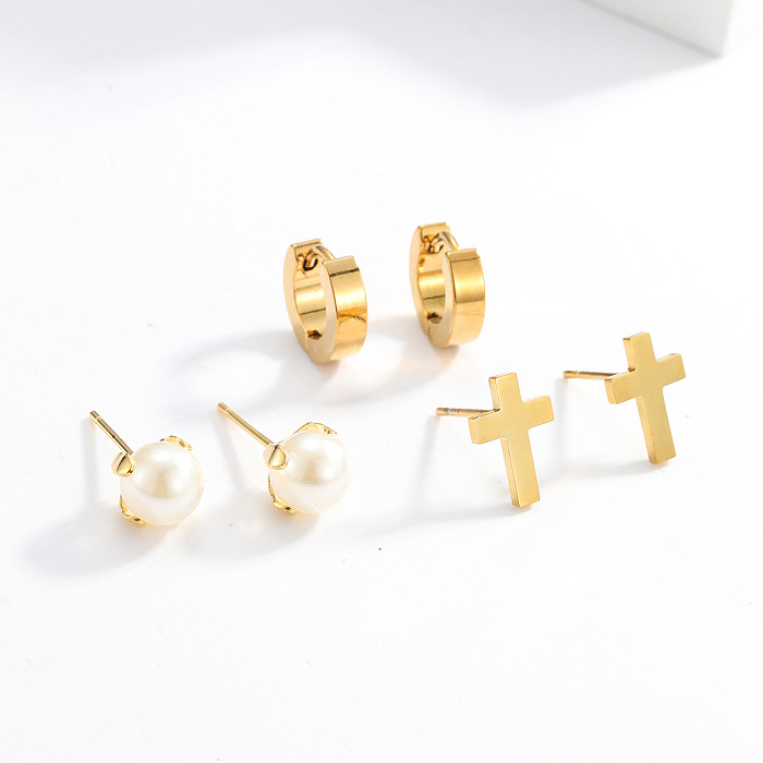 3 pares de pendientes de circonio con incrustaciones de perlas y mariposas en forma de corazón cruzado de estilo Simple a la moda