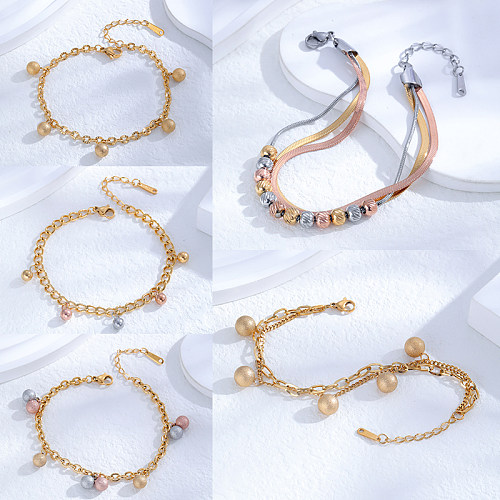 Bracelets plaqués or 24 carats en acier titane à boule de style classique de style simple