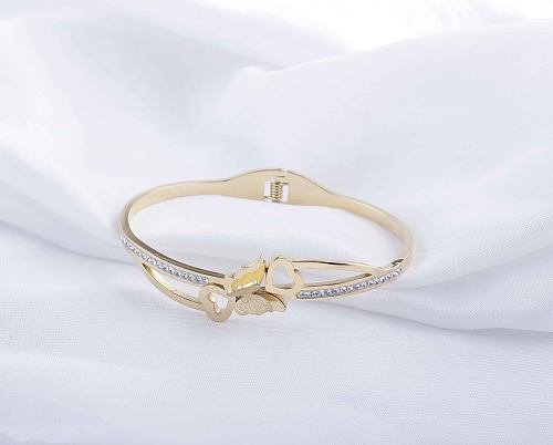 Bracelet élégant en forme de cœur rond avec incrustation en acier inoxydable et zircon plaqué or