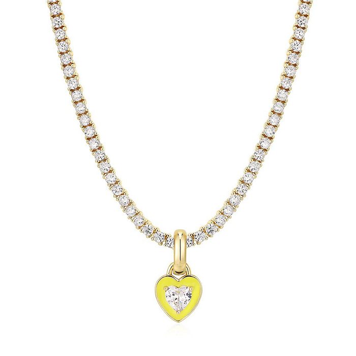 Elegante moderne Halskette mit geometrischem Herzform-Edelstahl-Inlay und Zirkon-Anhänger