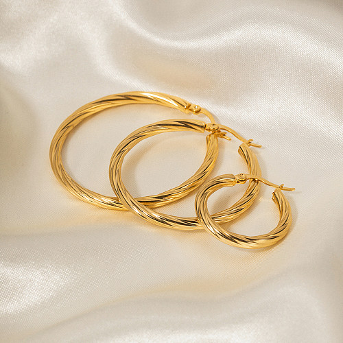 1 par de pendientes chapados en oro de 18 quilates redondos de acero inoxidable estilo Simple estilo INS