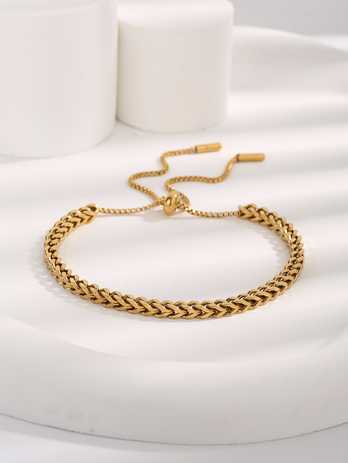 Elegantes pulseras chapadas en oro de acero inoxidable de color sólido estilo streetwear