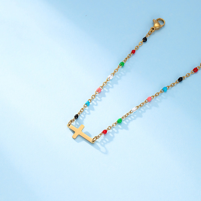 Bracelets plaqués or 18K de placage perlé d'acier inoxydable de forme de coeur de croix de trajet