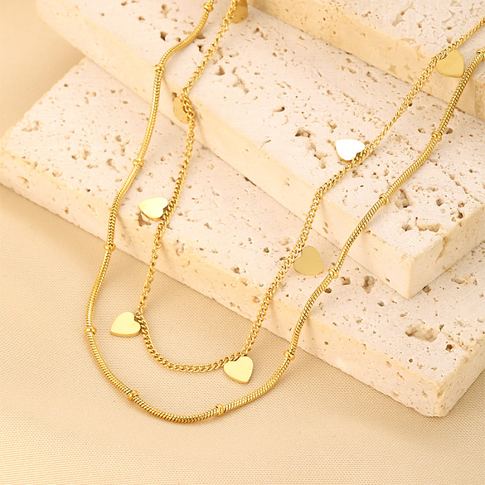 Collares de doble capa chapados en oro de 18K chapados en acero inoxidable con forma de corazón de estilo clásico