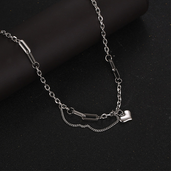 Collier pendentif en chaîne en acier inoxydable en forme de cœur de style simple