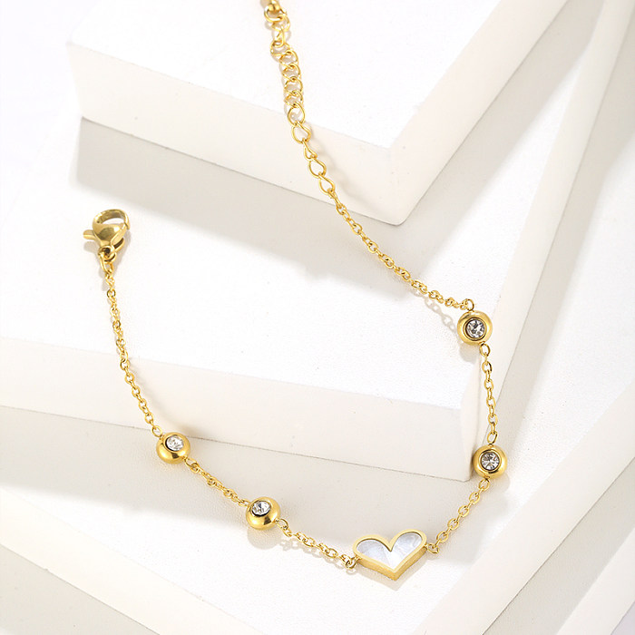Estilo simples estilo coreano forma de coração aço inoxidável chapeamento incrustação diamante artificial 18K pulseiras banhadas a ouro