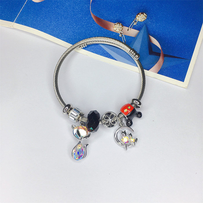 Bracelet de pierres précieuses artificielles d'incrustation de placage d'acier de titane de papillon de style simple