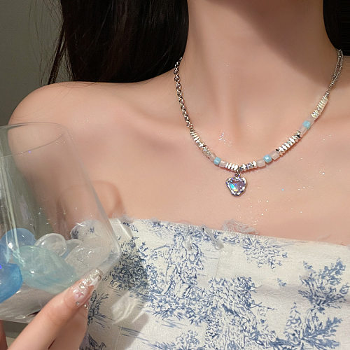 Collier pendentif en pierre de lune incrusté d'acier inoxydable perlé en forme de cœur doux