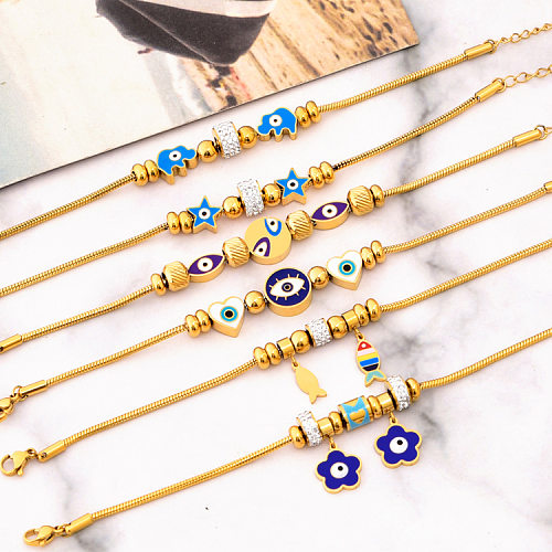 Damen-Armbänder mit herzförmiger Blume, Titan-Stahlbeschichtung, Intarsien aus künstlichen Edelsteinen