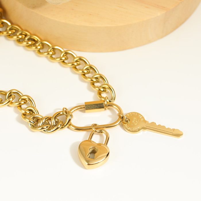 Lässiger schlichter Stil, Herzform, Schlüsselschloss, Edelstahl-Beschichtung, 18 Karat vergoldete Anhänger-Halskette