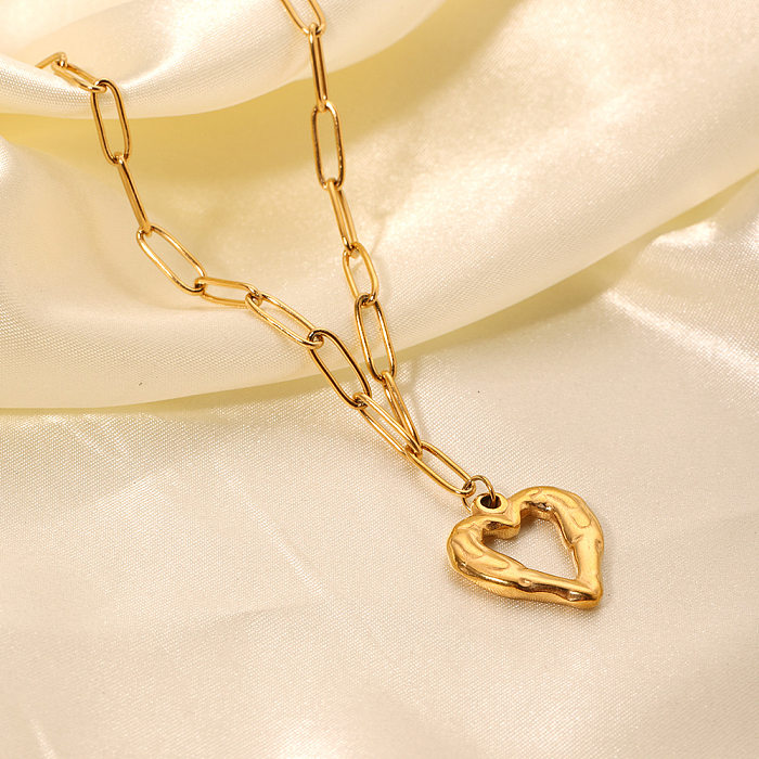 Collier pendentif plaqué or 18 carats, style Simple et décontracté, en forme de cœur, plaqué en acier inoxydable, ajouré