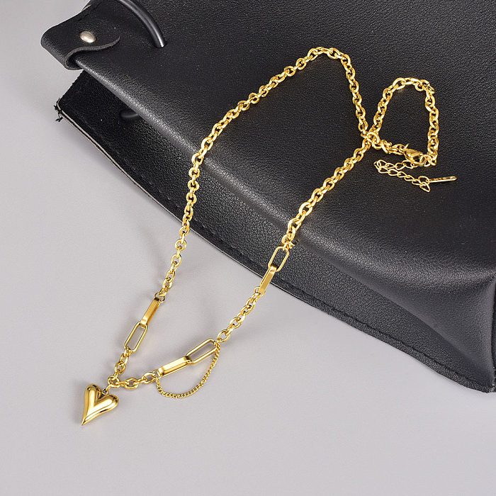 Collier pendentif plaqué or en acier inoxydable en forme de cœur élégant
