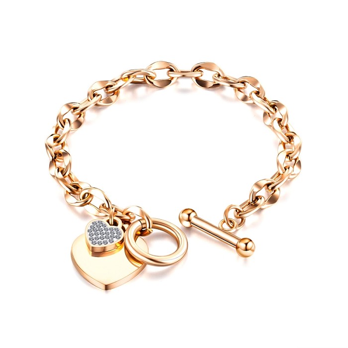 Süße herzförmige Edelstahl-Armbänder mit Toggle-Beschichtung und Inlay aus Strasssteinen, rosévergoldet. Vergoldete Armbänder