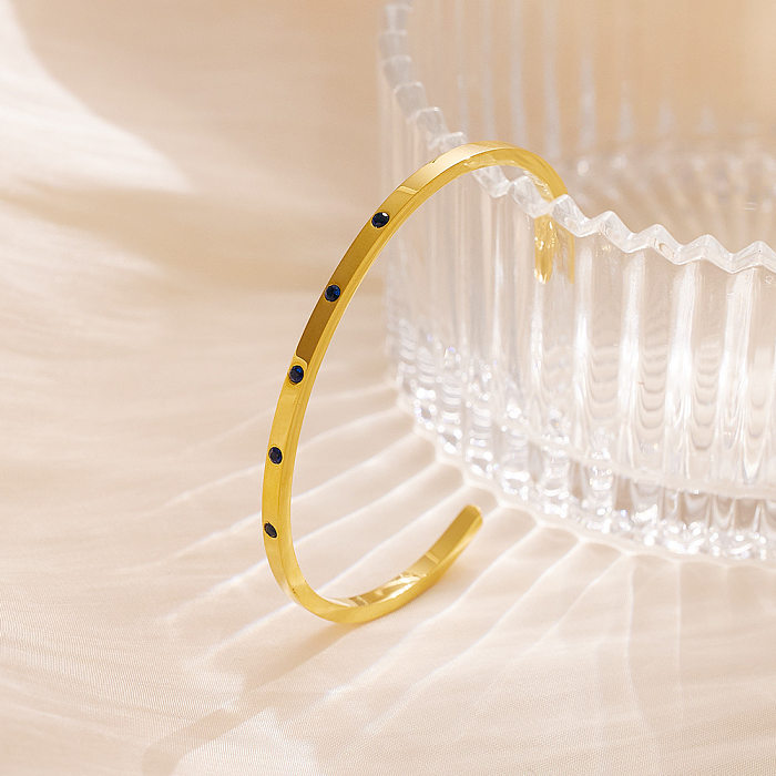 Einfache Manschettenarmbänder in C-Form aus Titanstahl mit 18 Karat vergoldetem Zirkon in großen Mengen