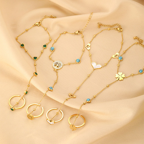 Coole, glänzende, herzförmige Armbänder aus Edelstahl mit 18-Karat-Vergoldung