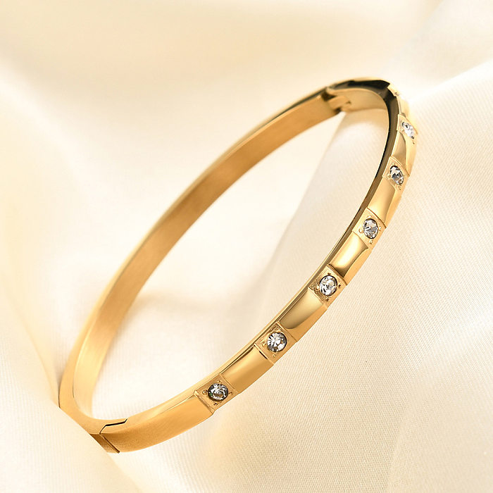Atacado estilo simples redondo chapeamento de aço inoxidável embutido pulseira de zircão banhado a ouro 18K
