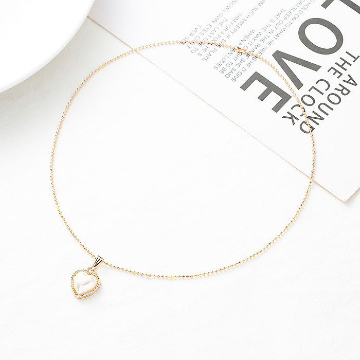 1 pieza de collar con colgante de perlas con incrustaciones de acero inoxidable en forma de corazón a la moda