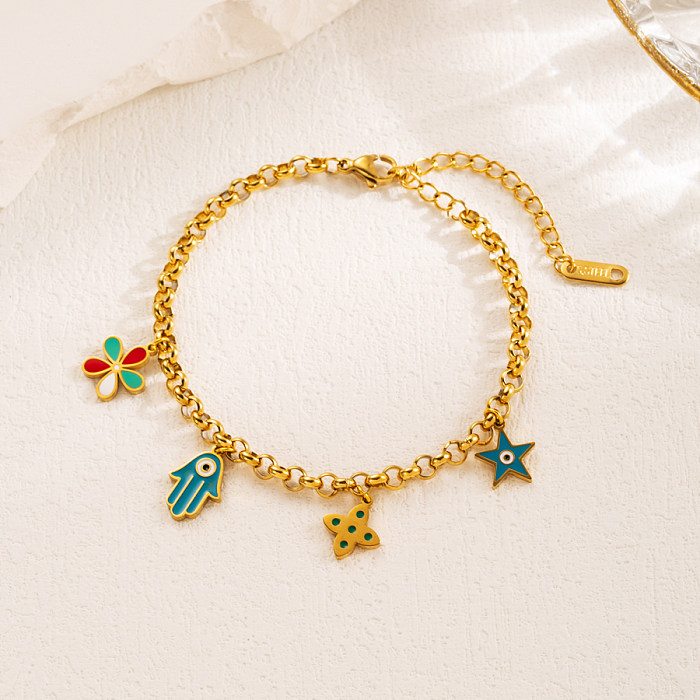 Bracelets plaqués or en acier titane avec fleur en forme de cœur de style moderne