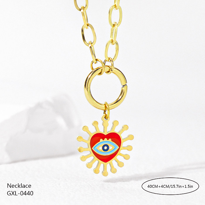 Lässige, klassische Halskette mit herzförmigem Auge und Intarsien aus Edelstahl mit Strasssteinen und vergoldetem Anhänger