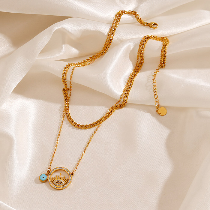 Glamouröse Teufelsauge-Edelstahl-Halsketten mit ausgehöhltem Inlay und künstlichem Diamant, 18 Karat vergoldet