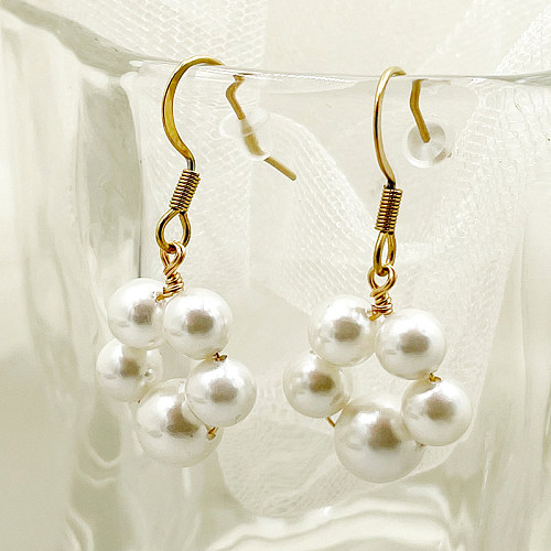 1 paire de boucles d'oreilles pendantes élégantes et classiques en acier inoxydable plaqué or avec fleur douce