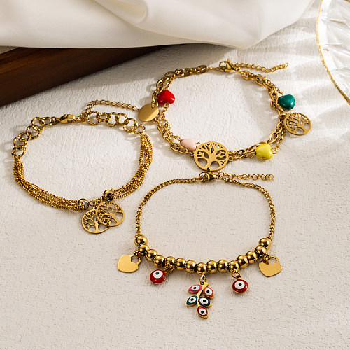 Pulseras chapadas en oro esmaltadas en capas de perlas de imitación de acero inoxidable con forma de corazón y luna de ojo de diablo informal