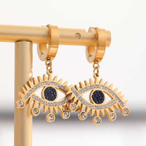 1 par de pendientes colgantes chapados en oro con incrustaciones de ojos Retro elegantes de acero inoxidable con diamantes de imitación y circonitas