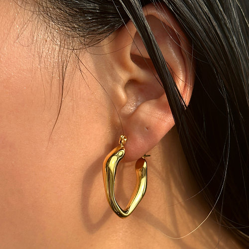 1 paire de boucles d'oreilles créoles irrégulières en acier inoxydable, streetwear