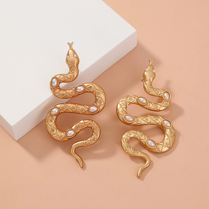 1 paire de clous d'oreilles plaqués or, Style Simple, incrustation de placage en acier serpent, perles