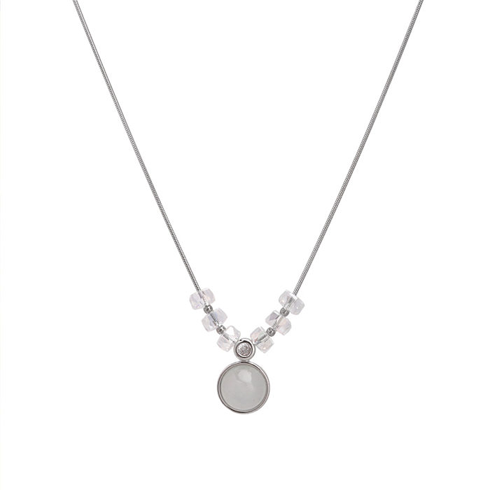 Collier pendentif en pierre de lune avec incrustation de placage en acier inoxydable géométrique pour femme élégante