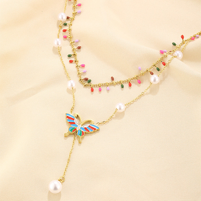 Elegantes collares de doble capa chapados en oro de 18 quilates con incrustaciones de perlas artificiales de acero inoxidable de color sólido