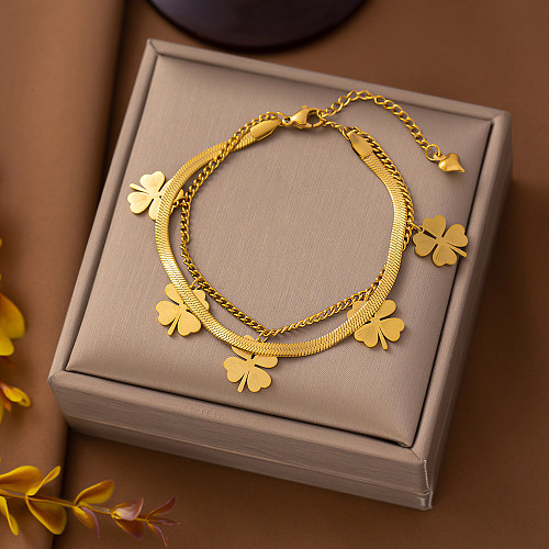 Bracelets plaqués or 18 carats en acier titane de base à trèfle à quatre feuilles