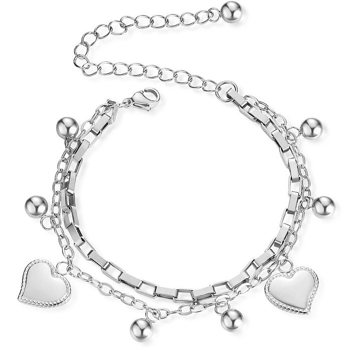 Pulseras de chapado de acero de titanio con forma de corazón de moda