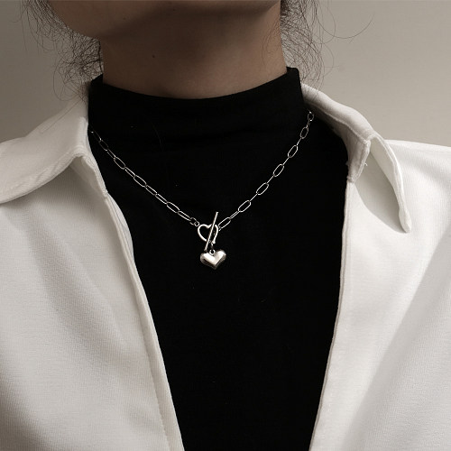 Halskette mit herzförmigem Edelstahl-Knebelanhänger im IG-Stil