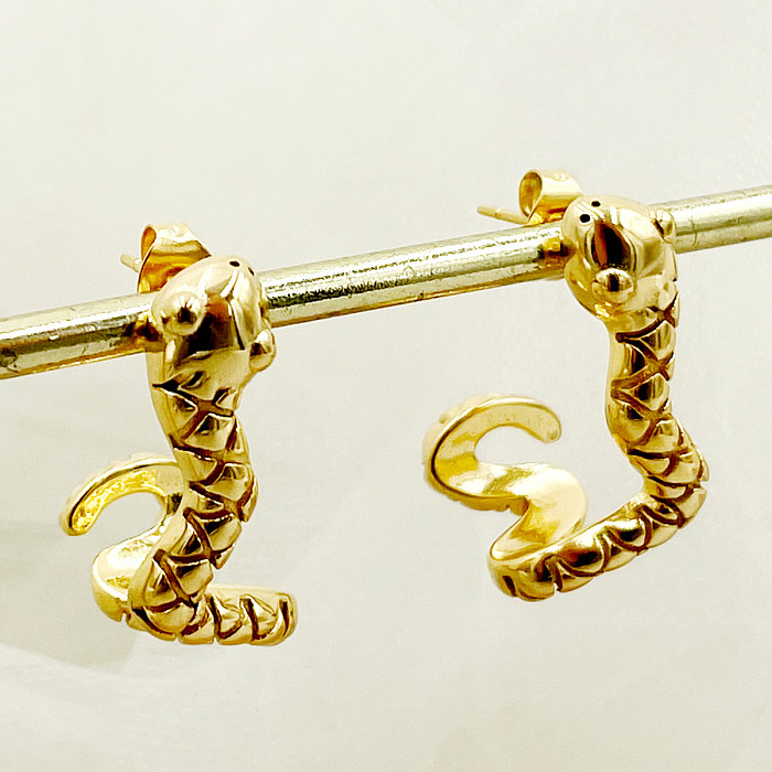 1 par de brincos banhados a ouro com zircônia de aço inoxidável estilo simples