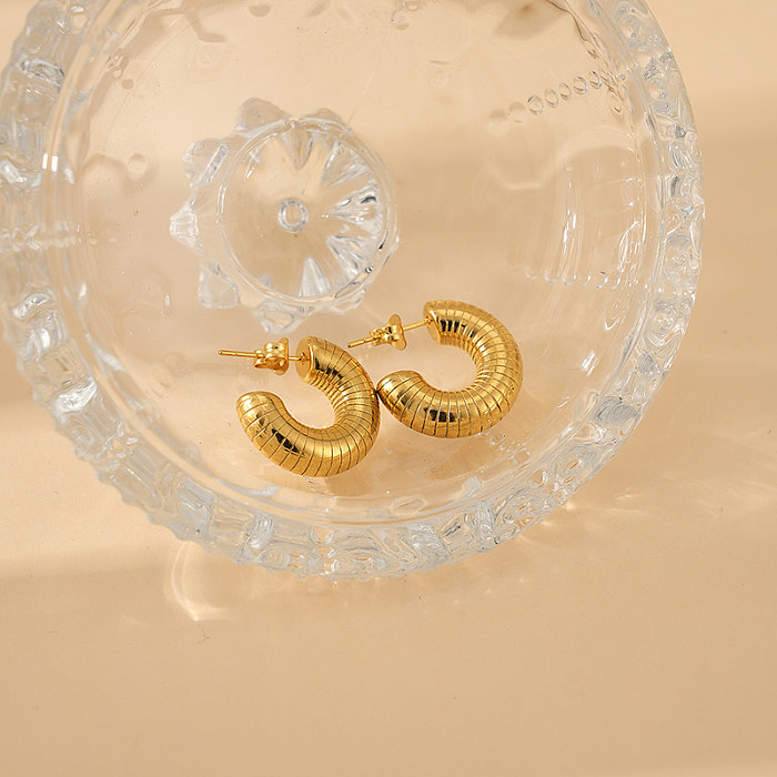 1 Paar glamouröse, moderne, schlichte C-förmige, polierte, vergoldete Ohrstecker aus Edelstahl