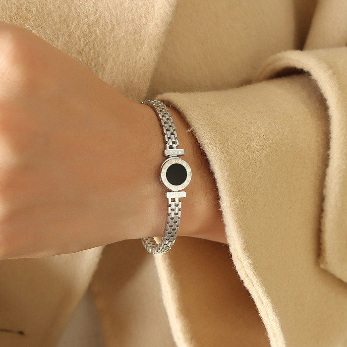 Bracelet plaqué or 18 carats en acrylique avec incrustation d'acier titane rond luxueux et élégant