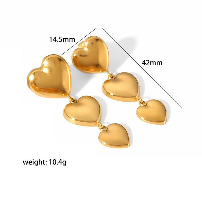 1 par de pendientes colgantes chapados en oro de 18 quilates de acero inoxidable pulido con forma de corazón de estilo clásico