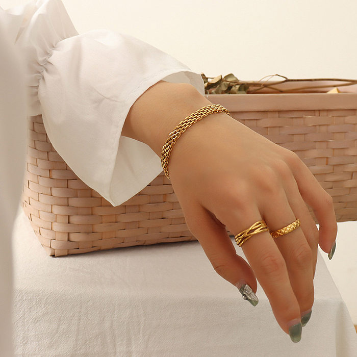 Bracelet en or 18 carats en acier au titane simple pour femme