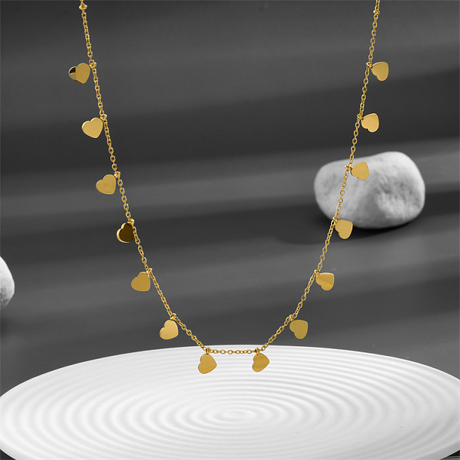 Collar chapado en oro de 18 quilates con forma de corazón de pentagrama de estilo simple