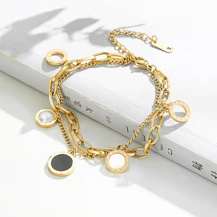 Nouveau Bracelet pour femme en acier titane Double couche de couleur contrastée avec coquillages noirs et blancs