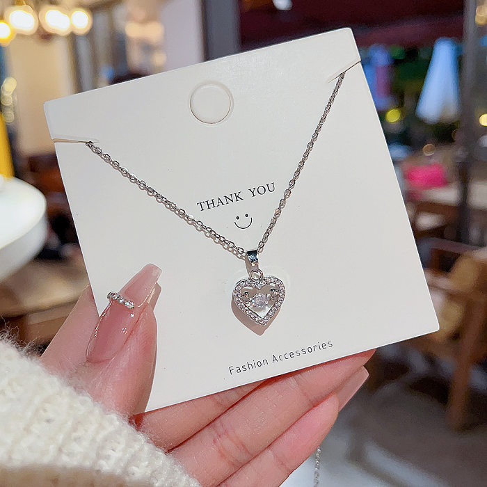 Collar con colgante de diamante artificial con incrustaciones de acero inoxidable con forma de corazón de estilo simple