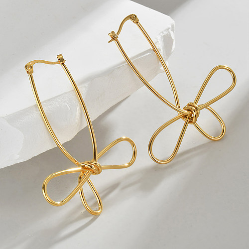 1 par de elegantes pendientes colgantes chapados en oro de 18 quilates de acero inoxidable con diseño de flores