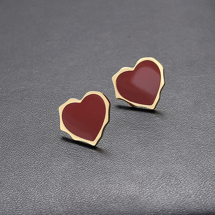 1 paire de clous d'oreilles en acier inoxydable plaqué or 18 carats en forme de cœur pour dame